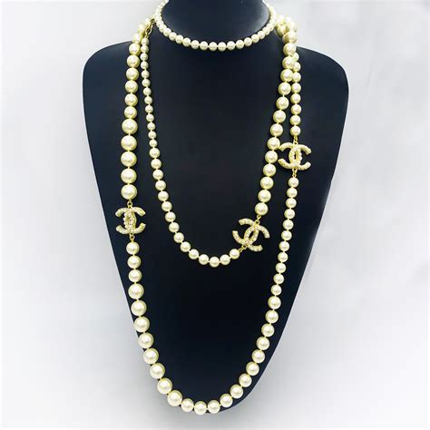 chanel 26 gold chain|chanel pearl necklace price list.